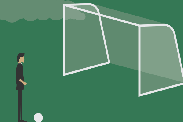 a graphic of a person about to kick a soccer ball into a net