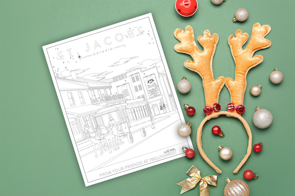 Colouring page of St. Jacobs neighbourhood in Woolwich Township, Ontario with christmas tree bulbs, bows and antler ear headband around it. From TrilliumWest Real Estate Brokerage.