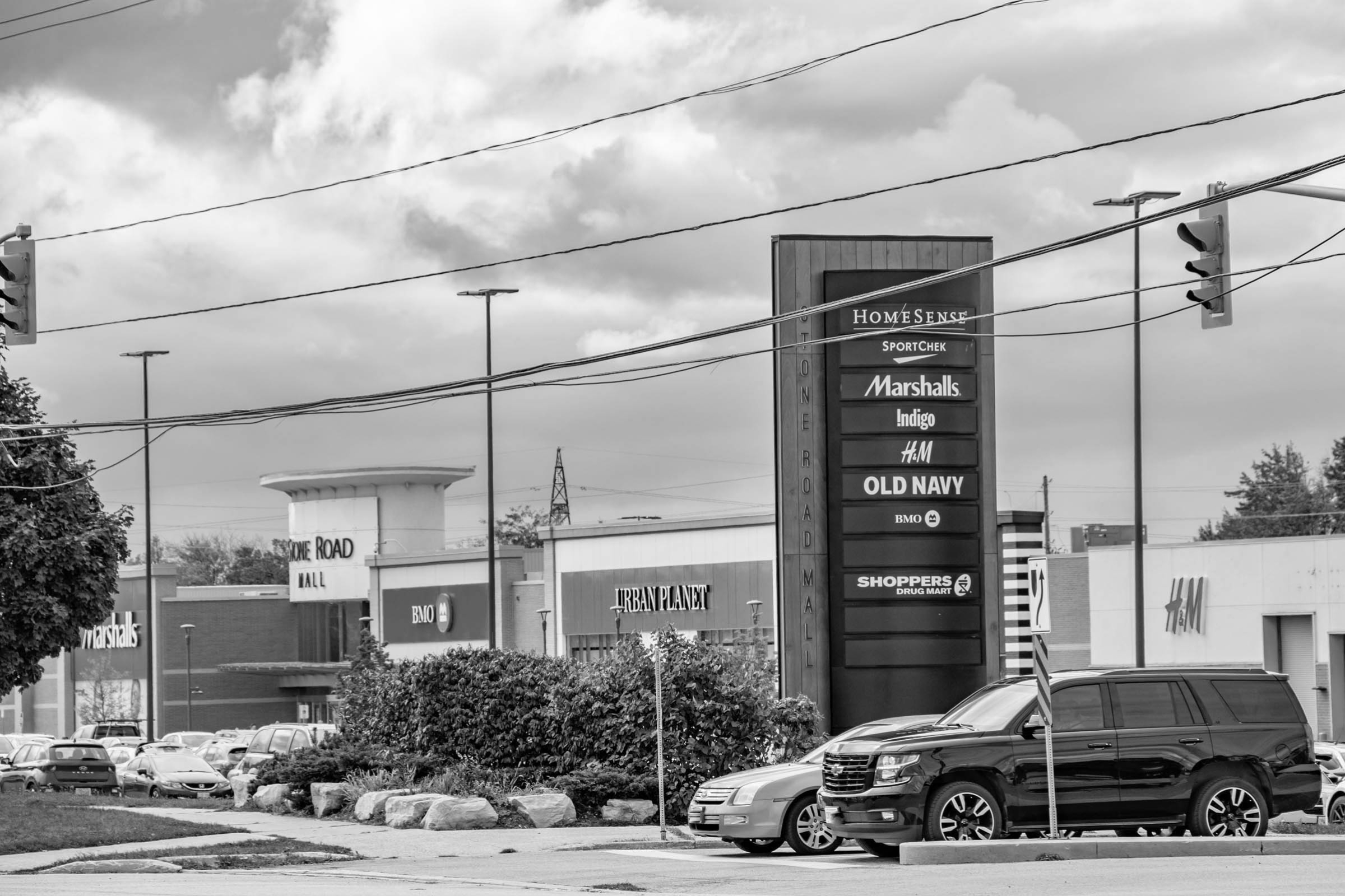 A photo looking at the Stone Road Mall, you can see the sign for multiple stores including Home Sense, Marshalls, Old Navy and more