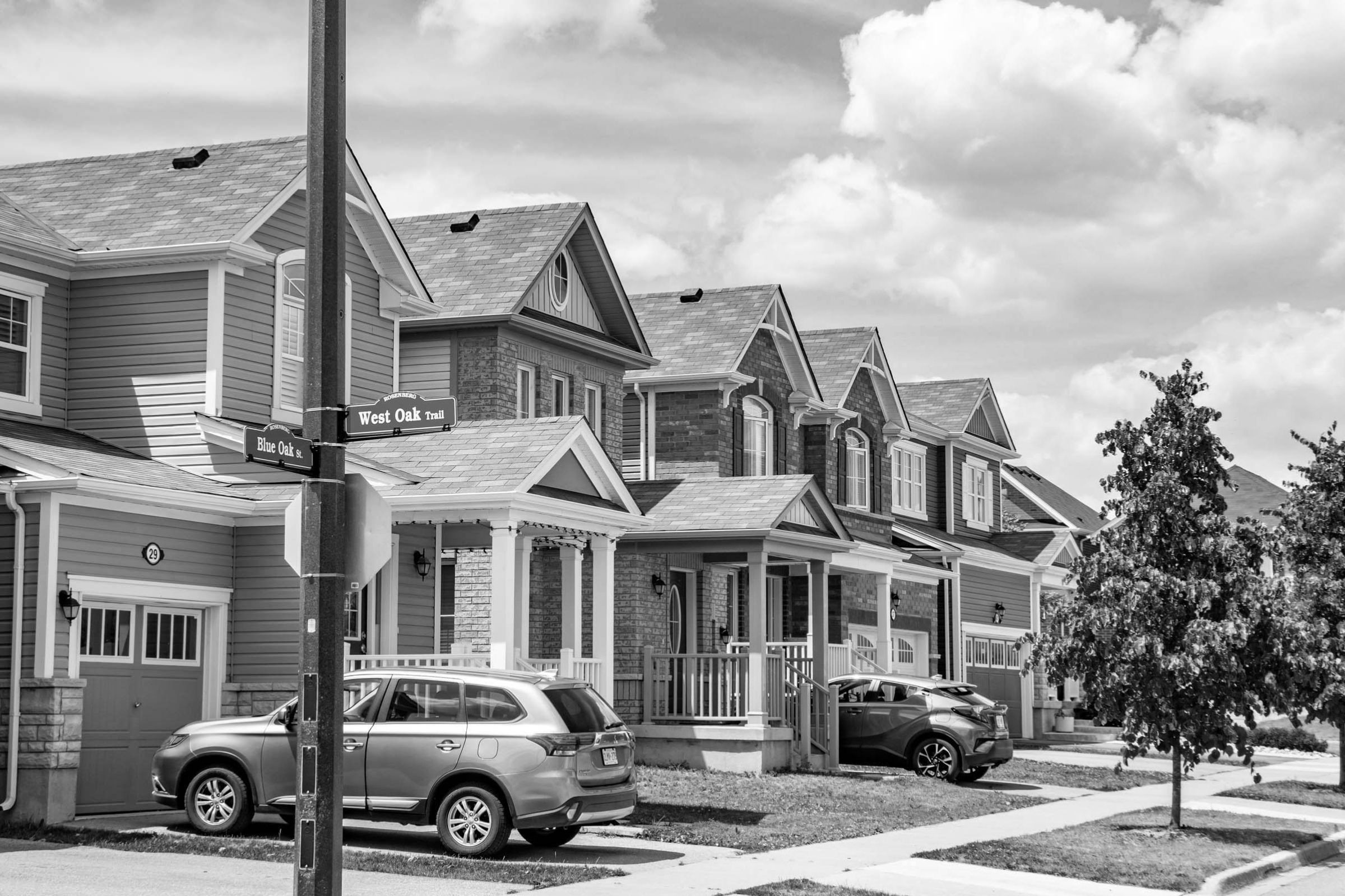a photo looking at a row of homes at the intersection of West Oak Trail and Blue Oak Street